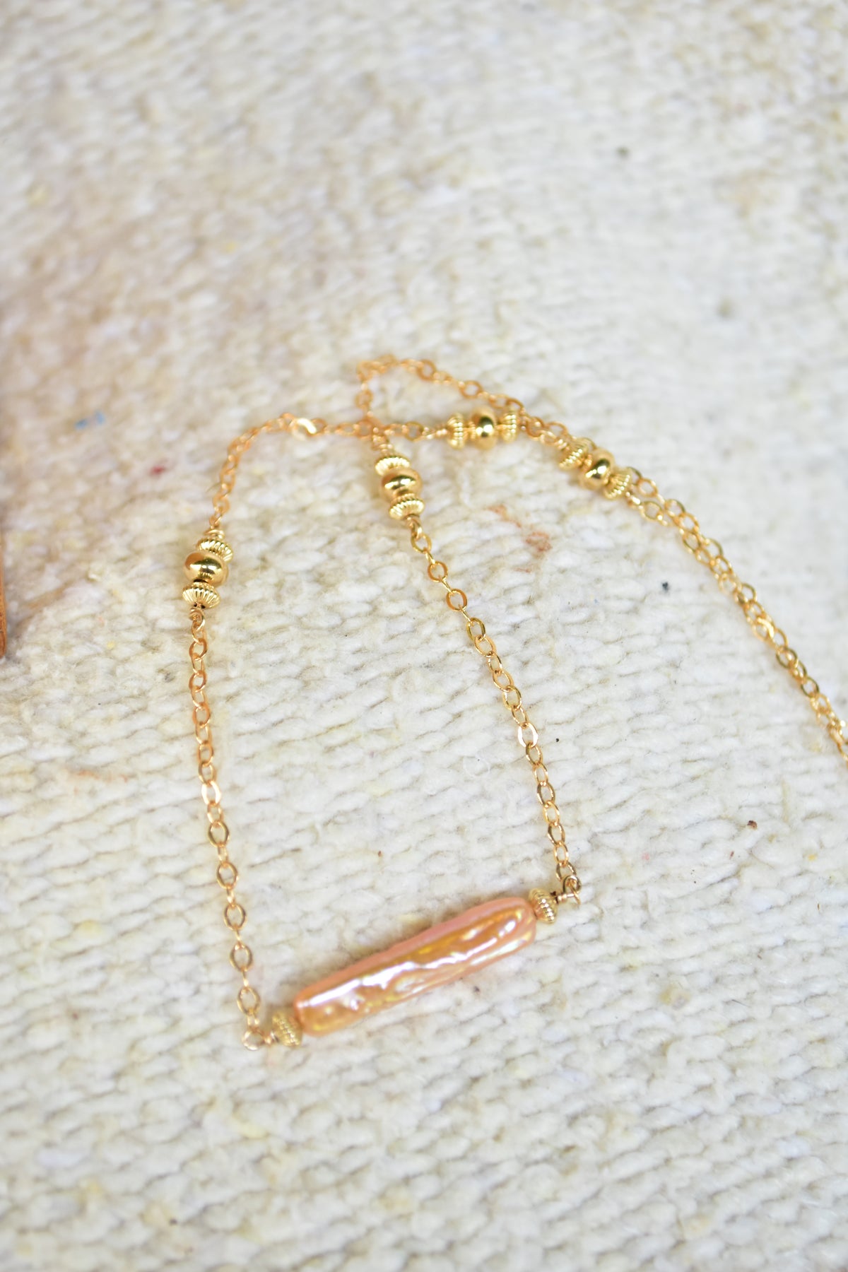 Peach pearl bar beaded necklace