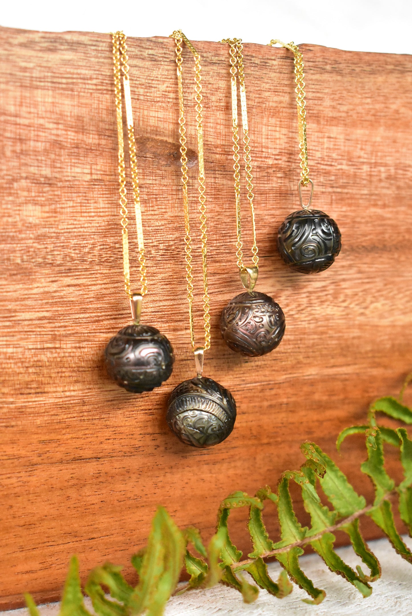 Carved Tahitian pearl pendant