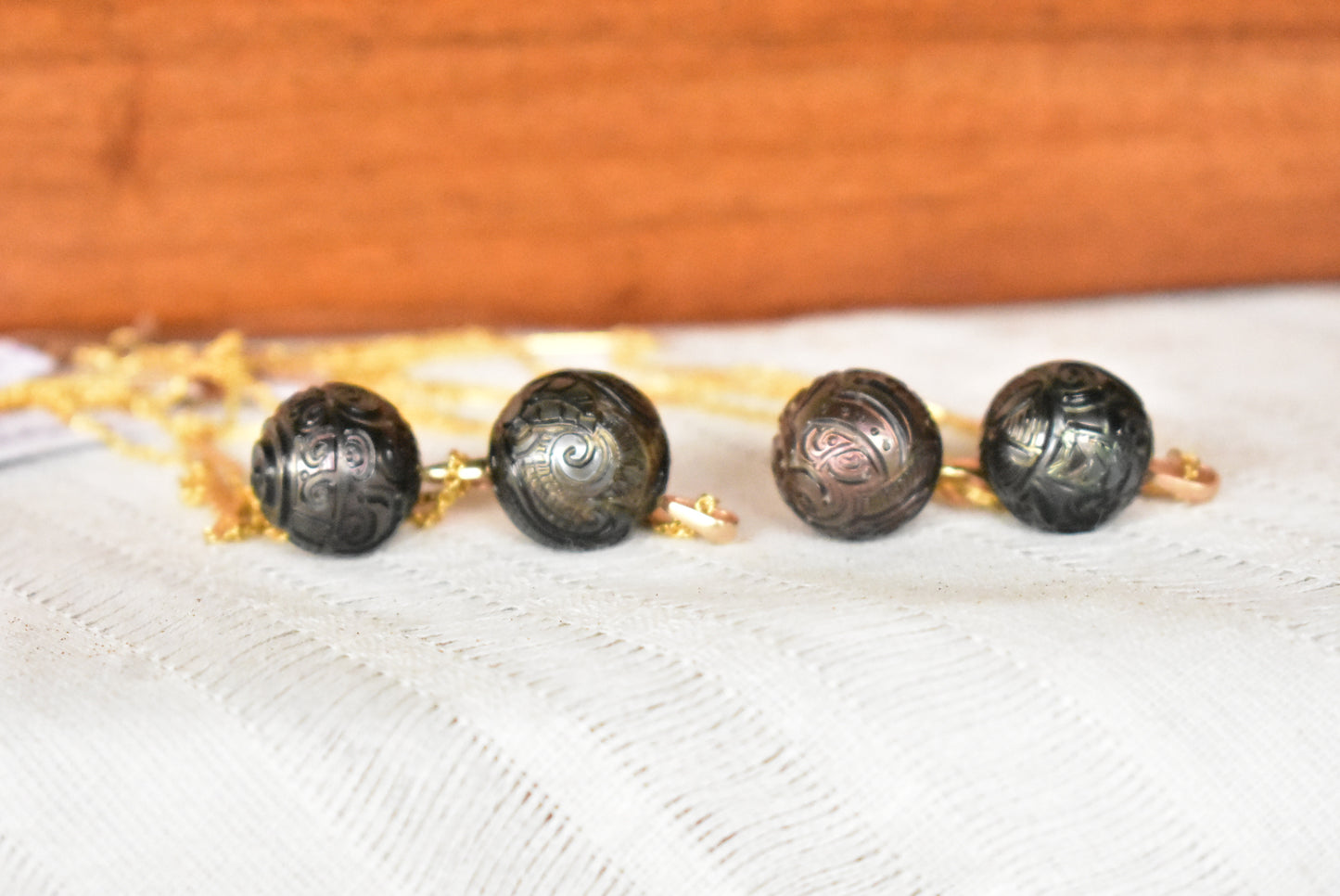 Carved Tahitian pearl pendant