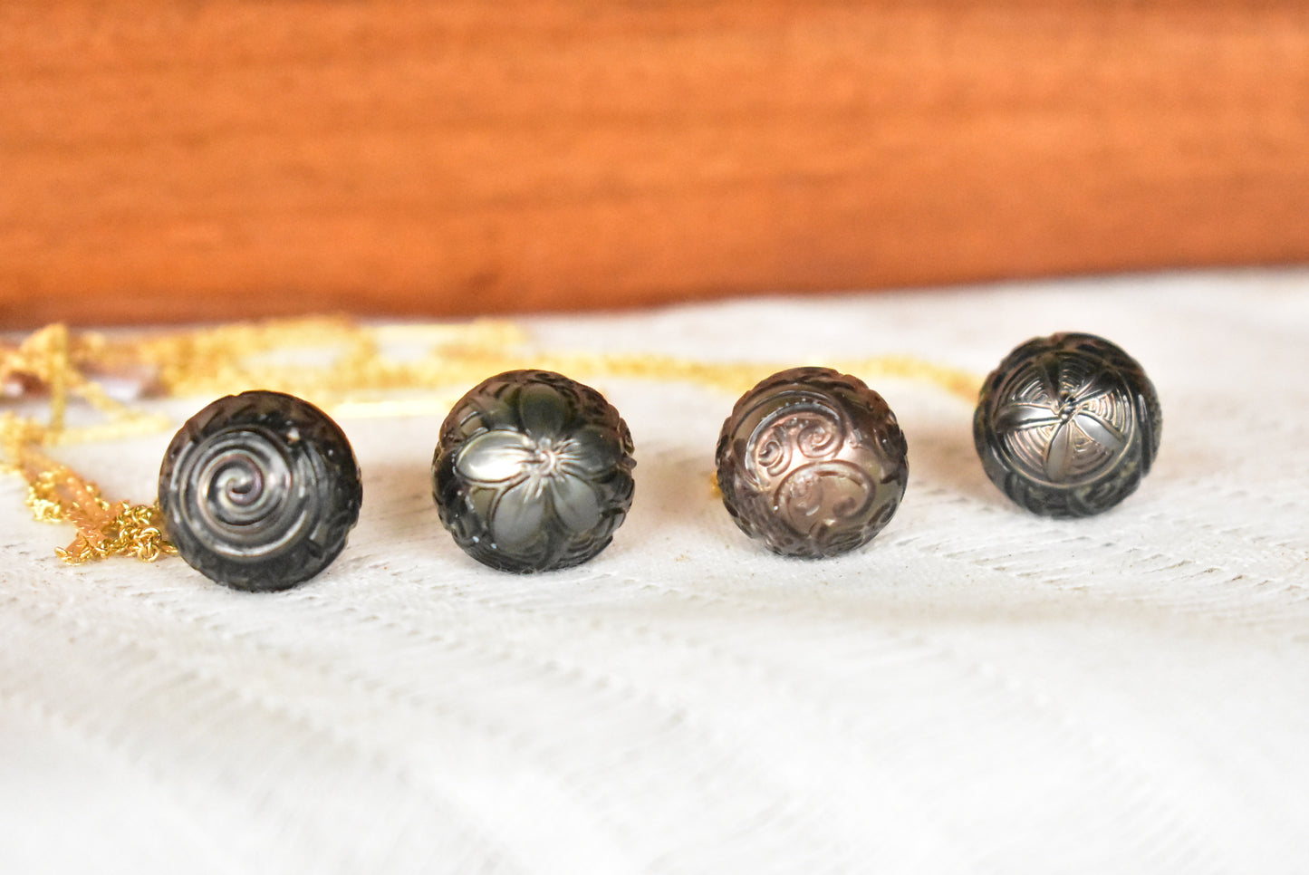 Carved Tahitian pearl pendant