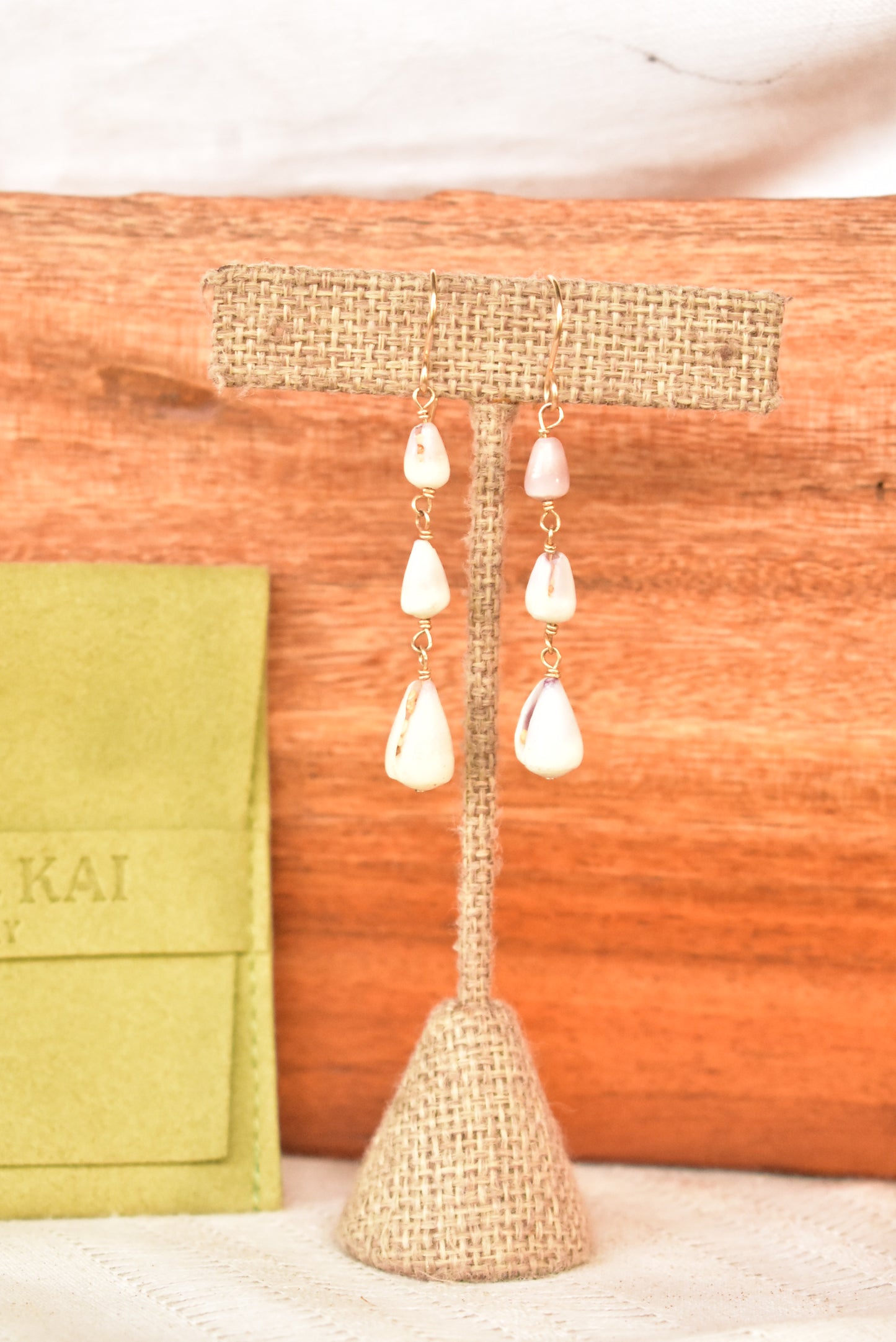 Triple cone shell earrings
