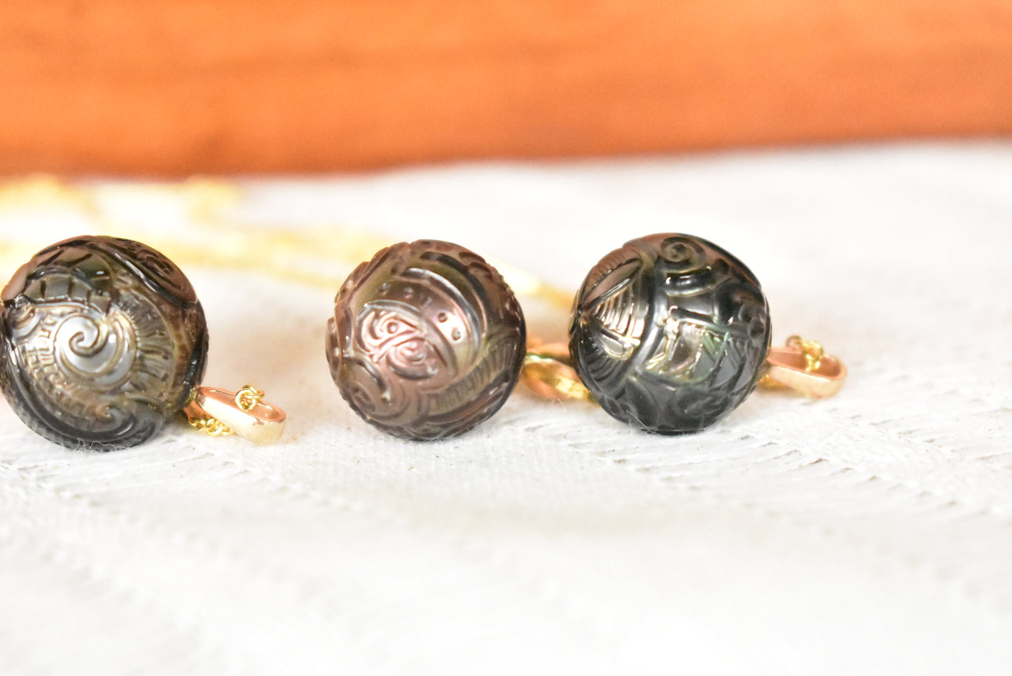 Carved Tahitian pearl pendant