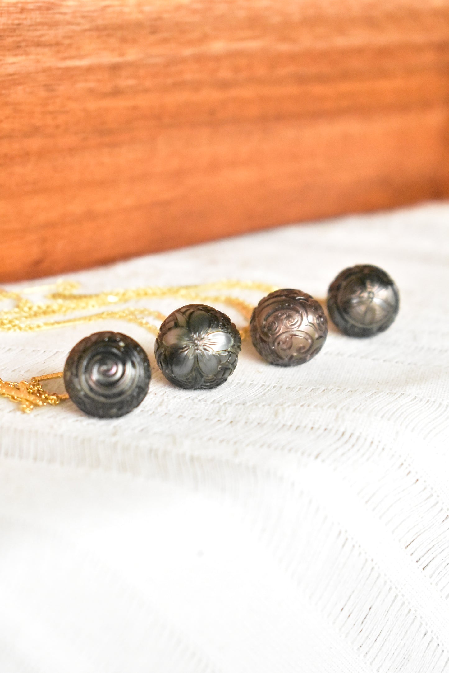 Carved Tahitian pearl pendant