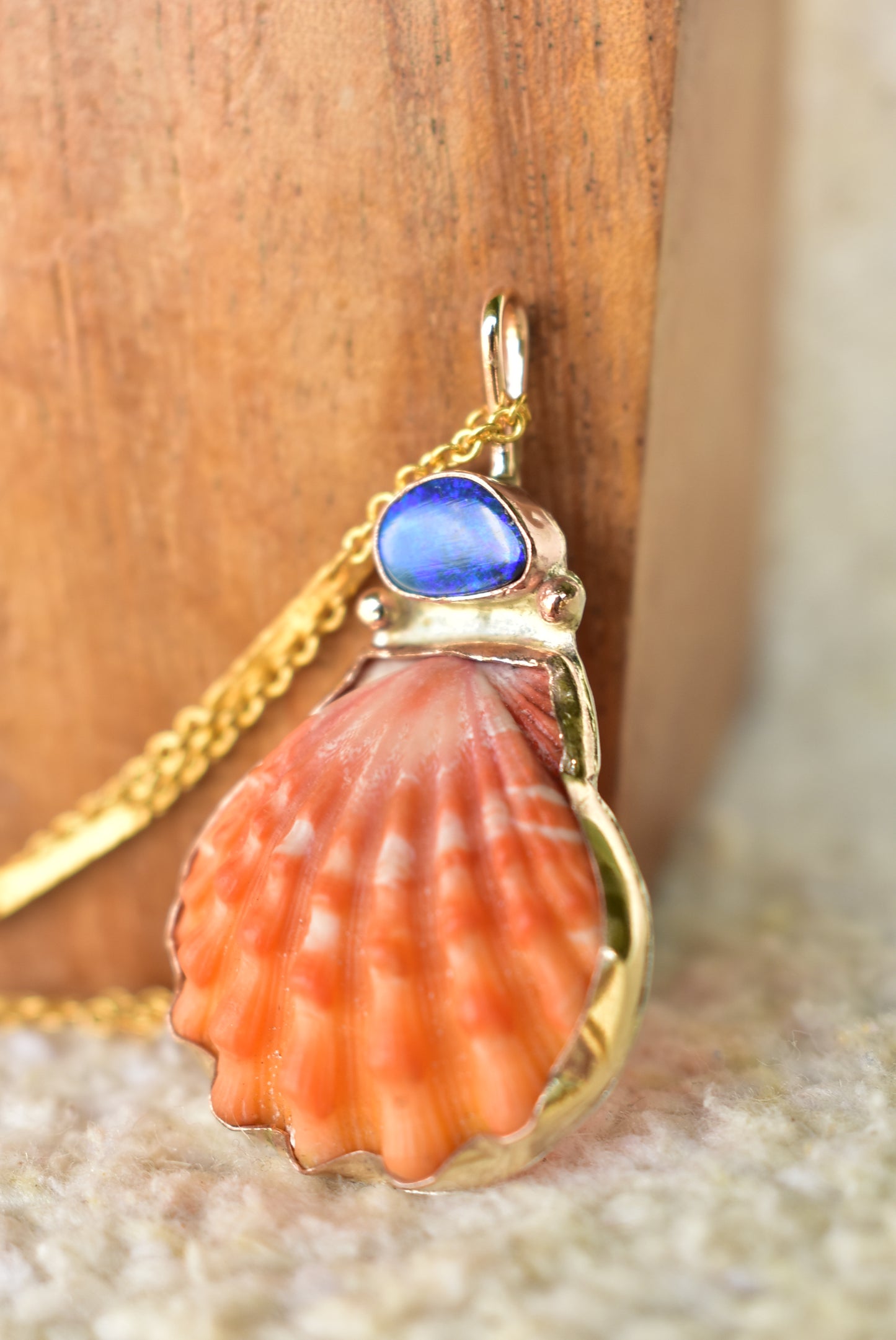 Red sunrise and opal pendant