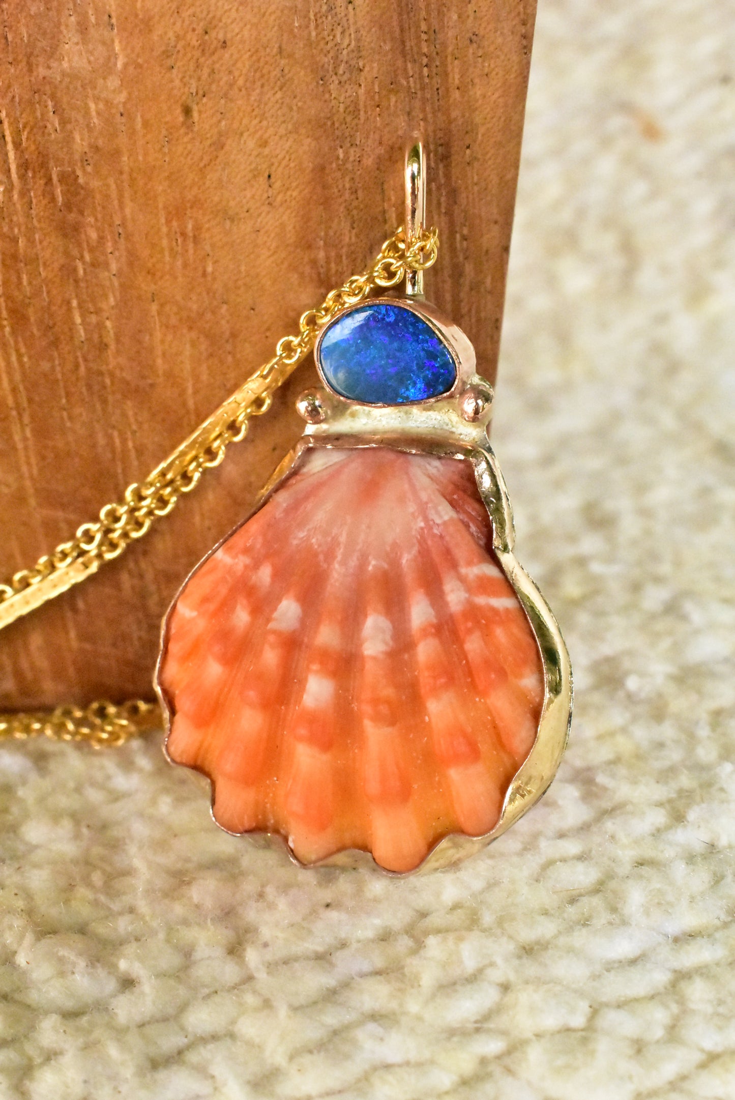 Red sunrise and opal pendant