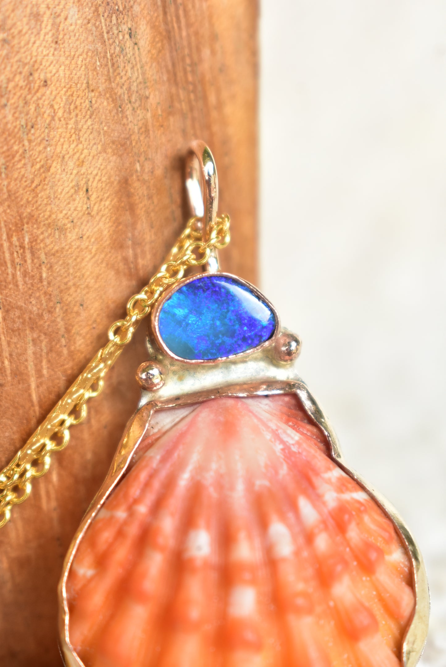 Red sunrise and opal pendant