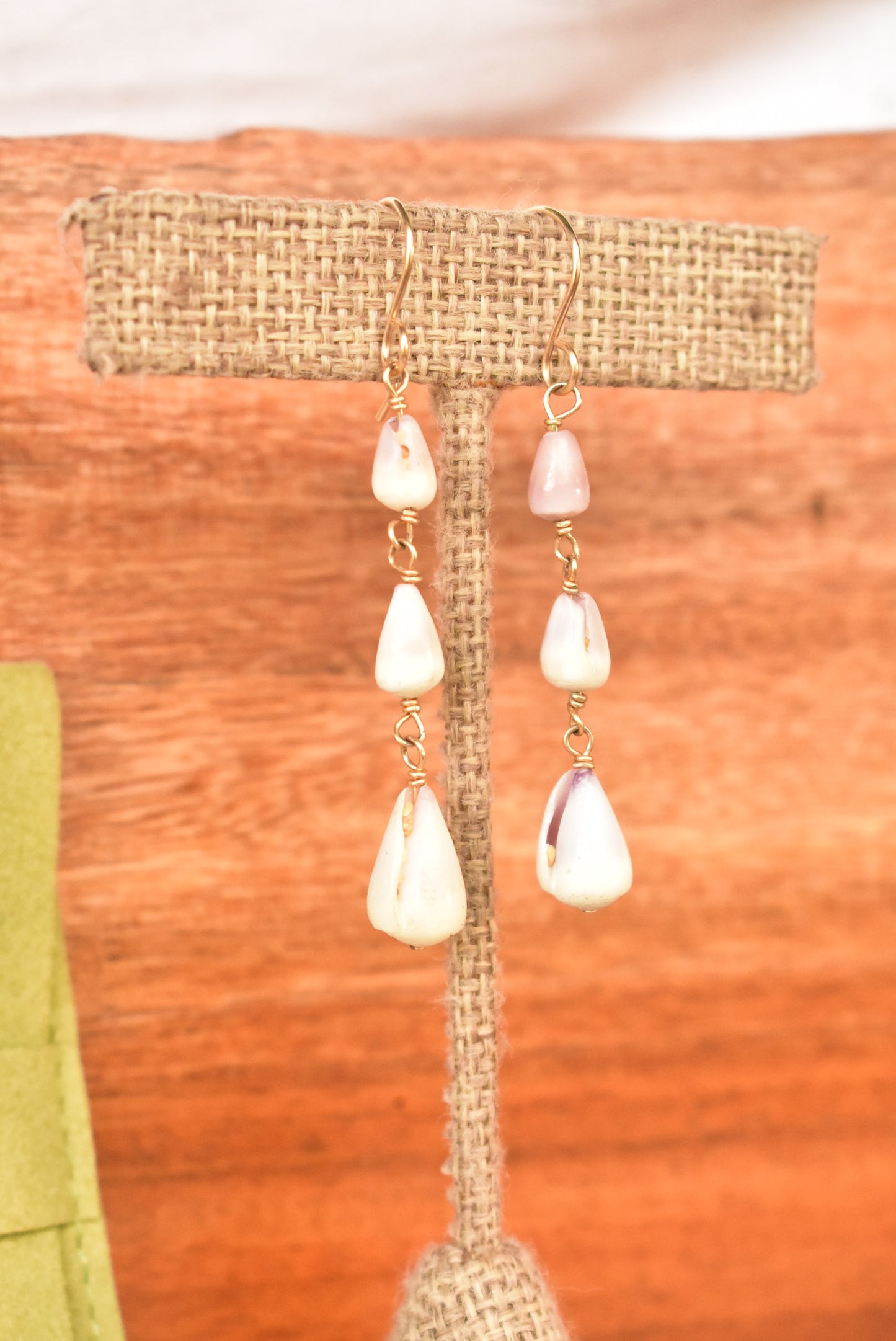 Triple cone shell earrings