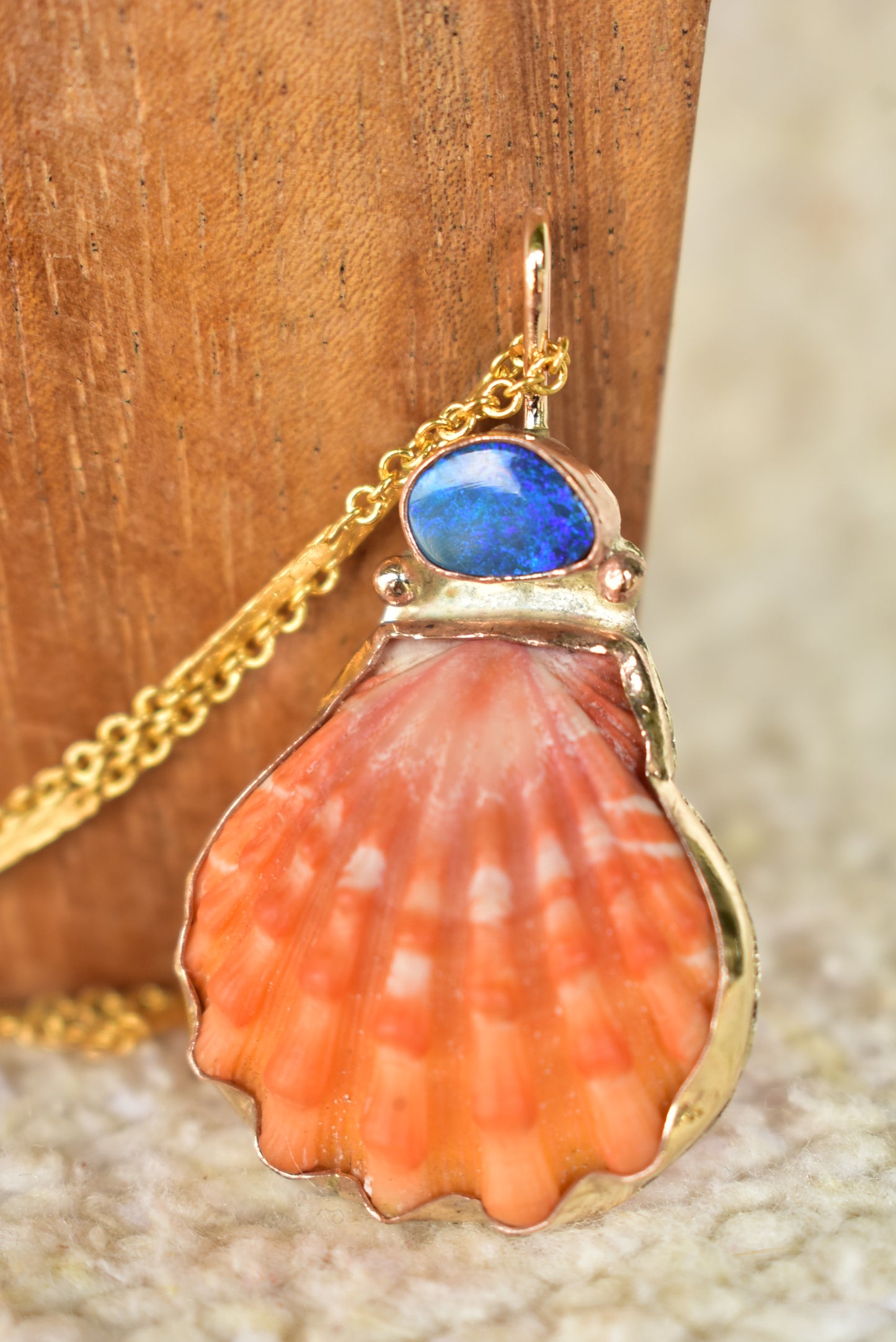 Red sunrise and opal pendant