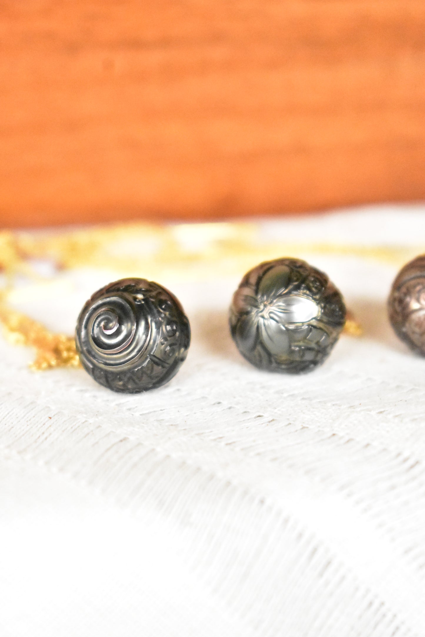 Carved Tahitian pearl pendant