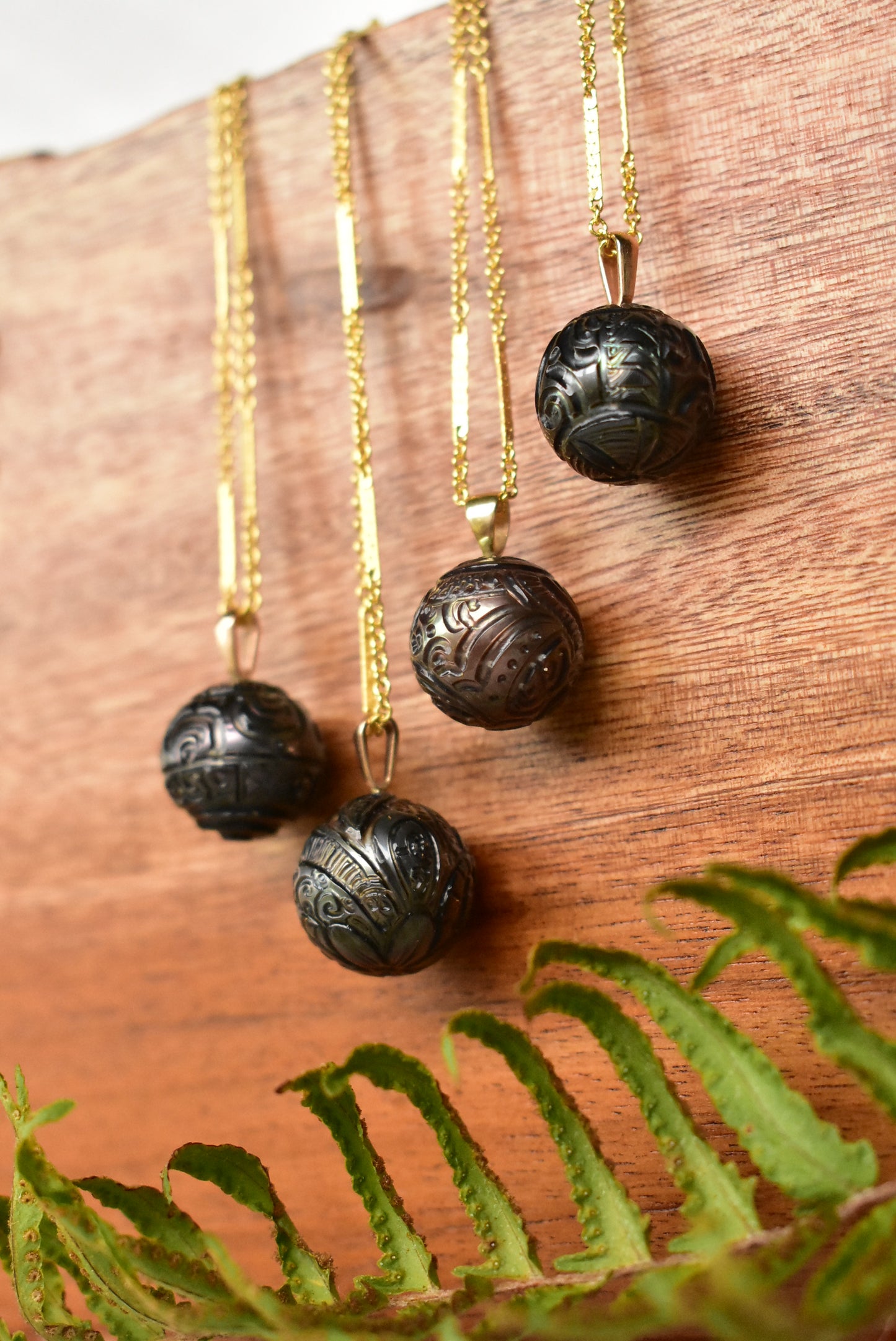 Carved Tahitian pearl pendant